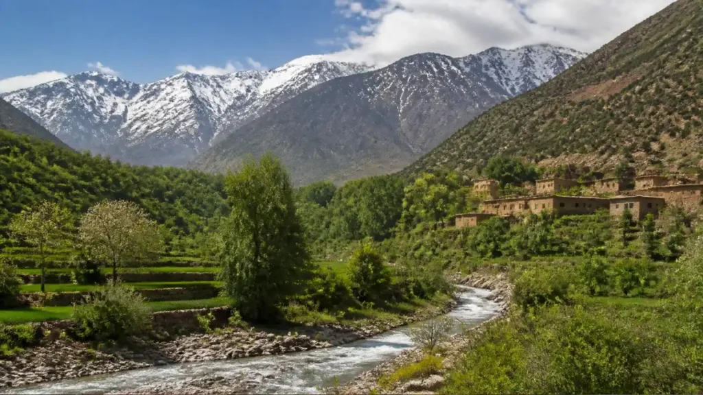 Green river valley with Berber houses and terraced fields in the Atlas Mountains