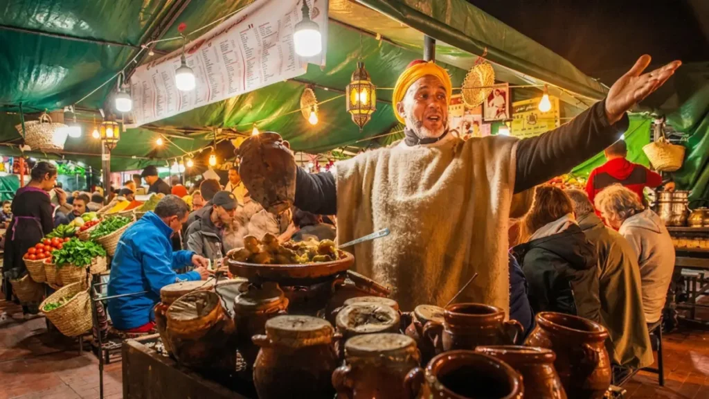 Marrakech night food tour in Jemaa el-Fnaa with glowing food stalls