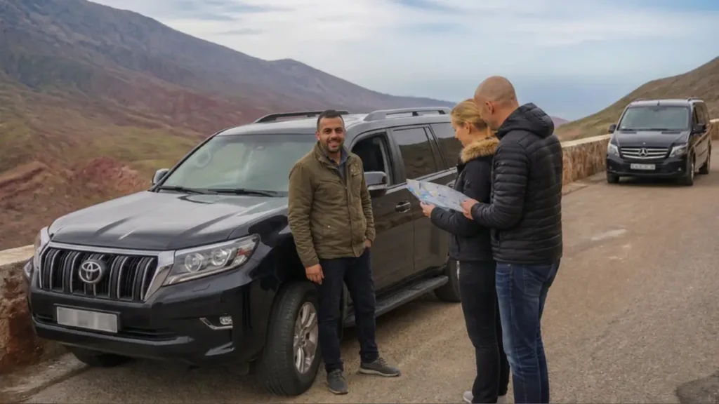 Private Moroccan driver-guide helping travelers plan their Marrakech to Merzouga route.