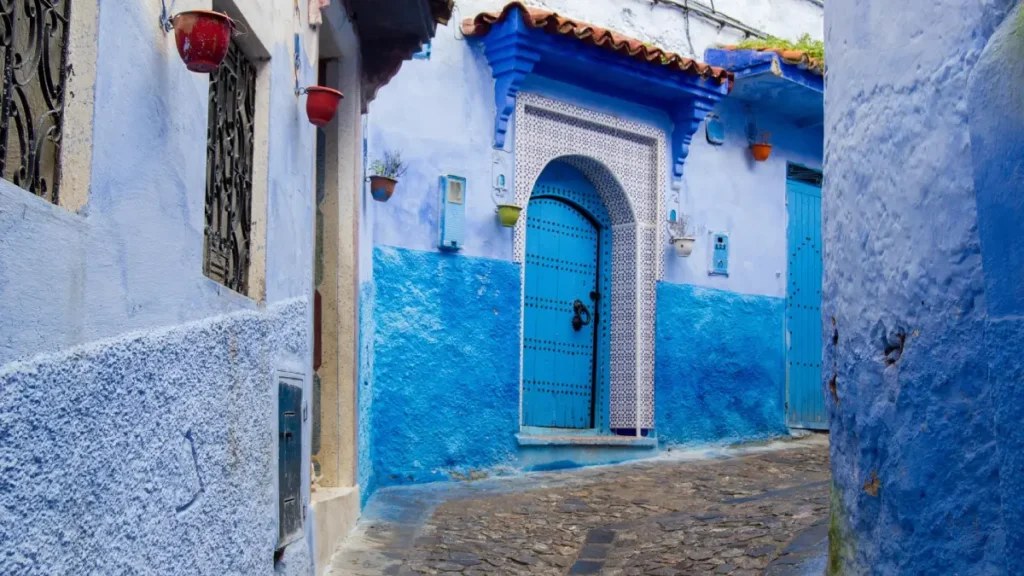 Blue painted street and doorway in the Chefchaouen Medina