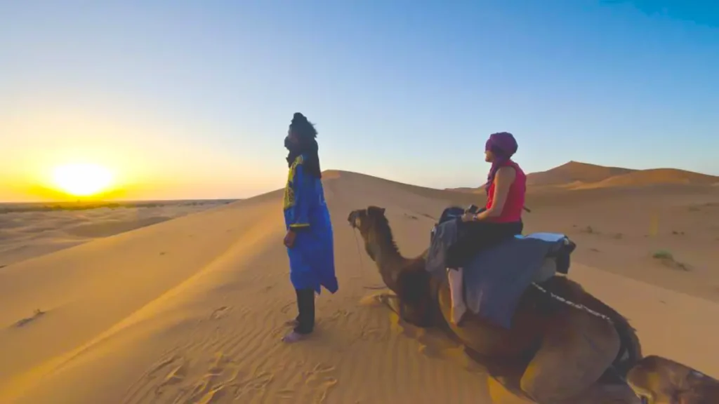 Camel ride at sunset in the Erg Chebbi dunes near Merzouga