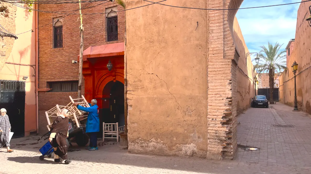 Traditional Medina street and riad showing where to stay in Marrakech