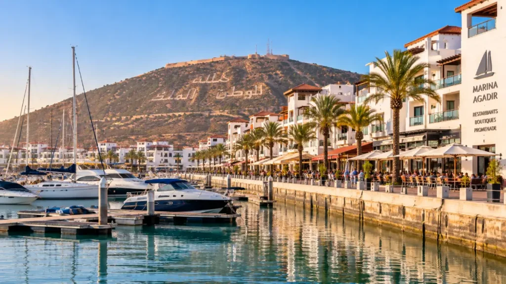 Agadir Marina with yachts, waterfront restaurants and hillside views in Morocco