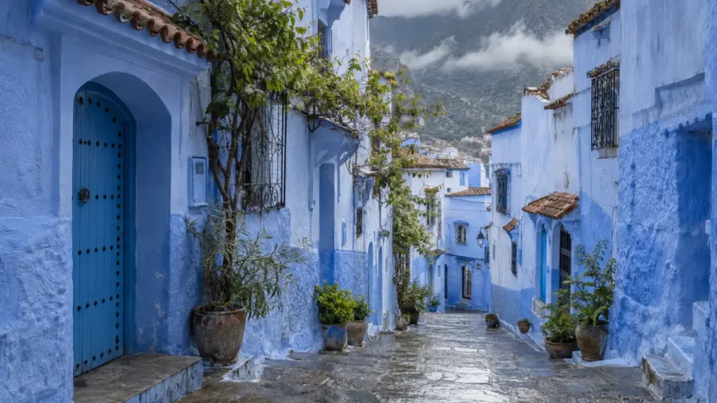 Wet blue street in Chefchaouen after a spring rain shower in March