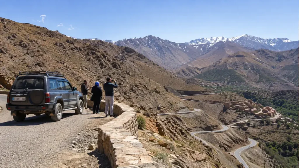 Travelers stopping on the High Atlas road from Marrakech to Zagora near Tizi n’Tichka
