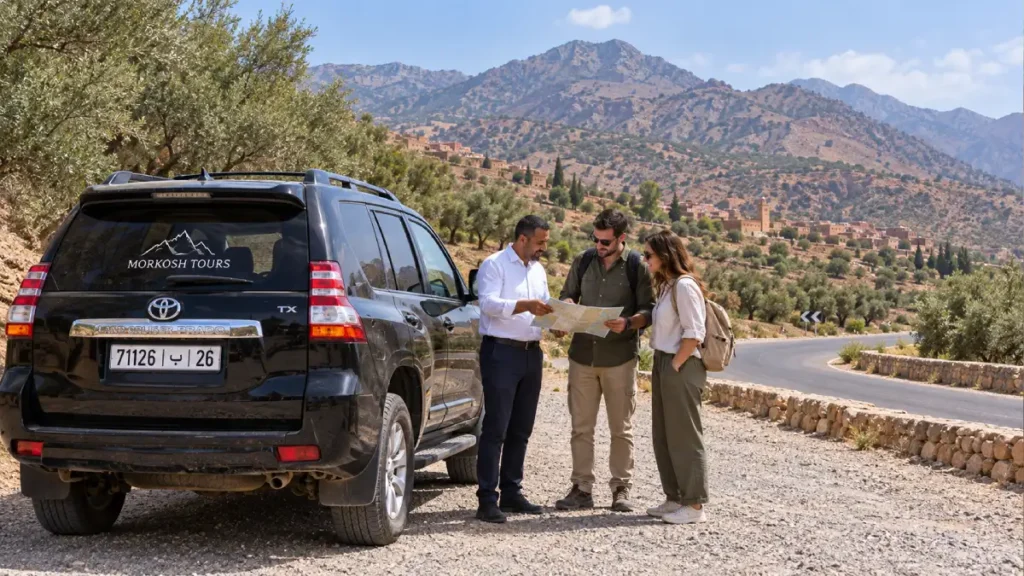 Driver and travelers checking a map beside a black Morkosh Tours Toyota Prado TX